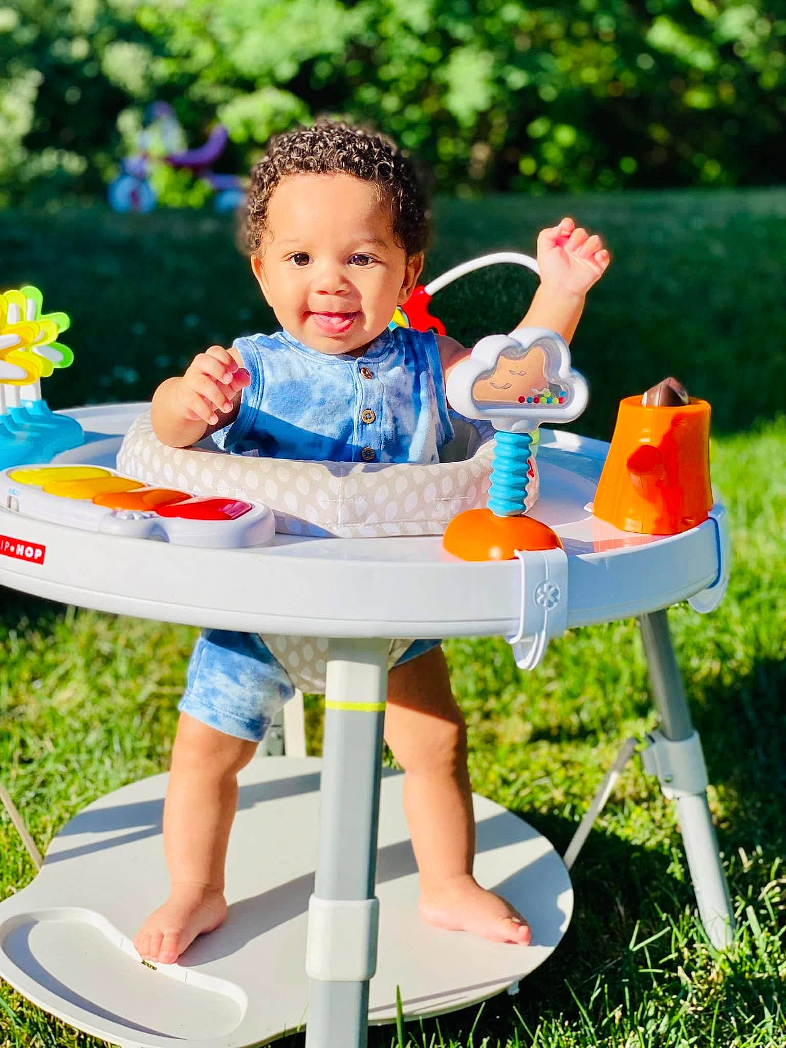 Cory joined the competition — help win amazing prizes! baby_toddler_clothing, chair, child, electric_blue, fun, grass, happy, leisure, outdoor_furniture, people_in_nature, person, play, recreation, shorts, sitting, smile, summer, t_shirt, table, toddler