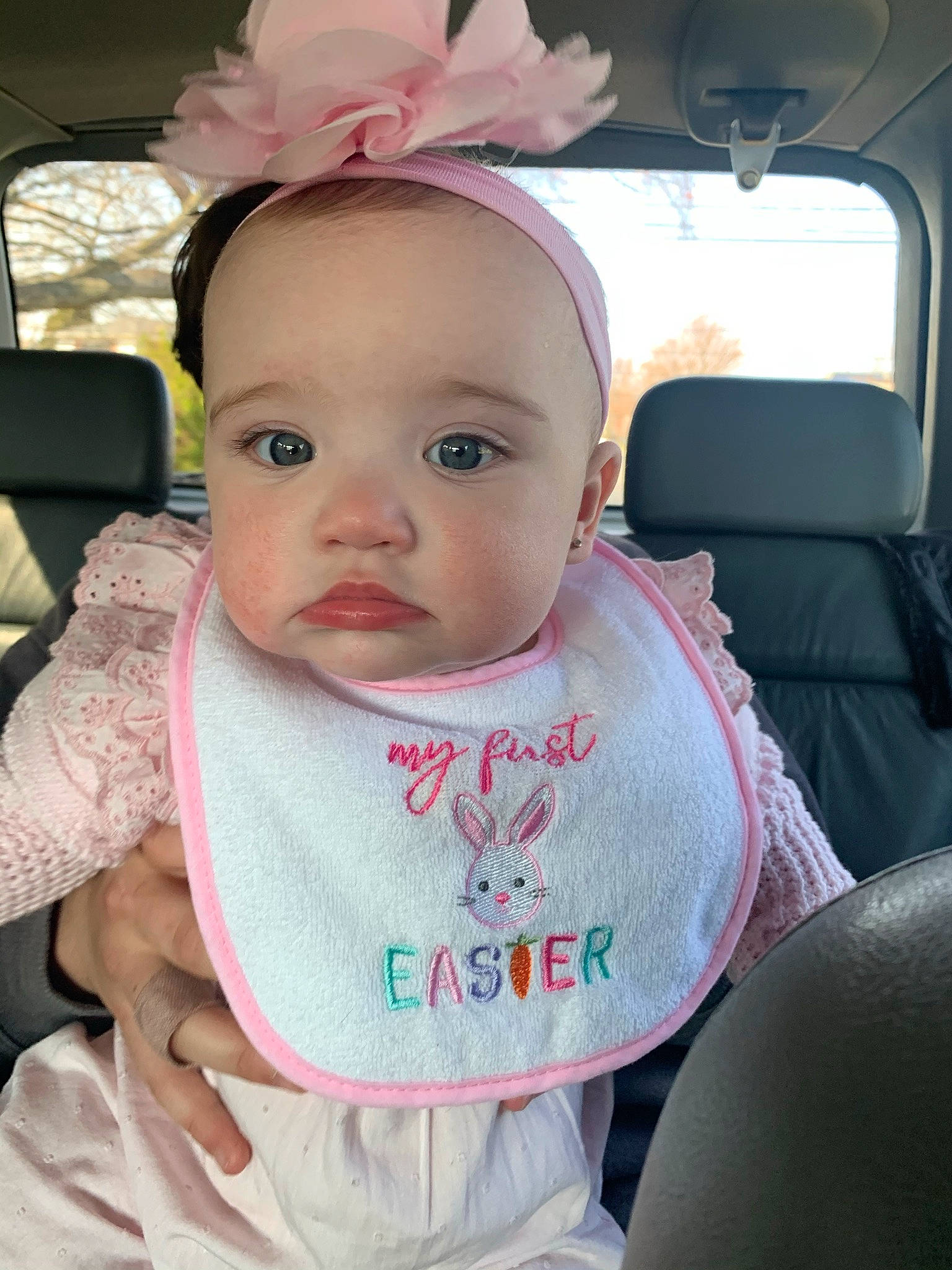 Mila Michele is registered to the contest to win money with this photo: baby, baby_toddler_clothing, cap, car_seat, cheek, chin, cool, ear, eyebrow, eyelash, happy, headband, iris, lip, person, pink, plant, seat_belt, skin, sleeve