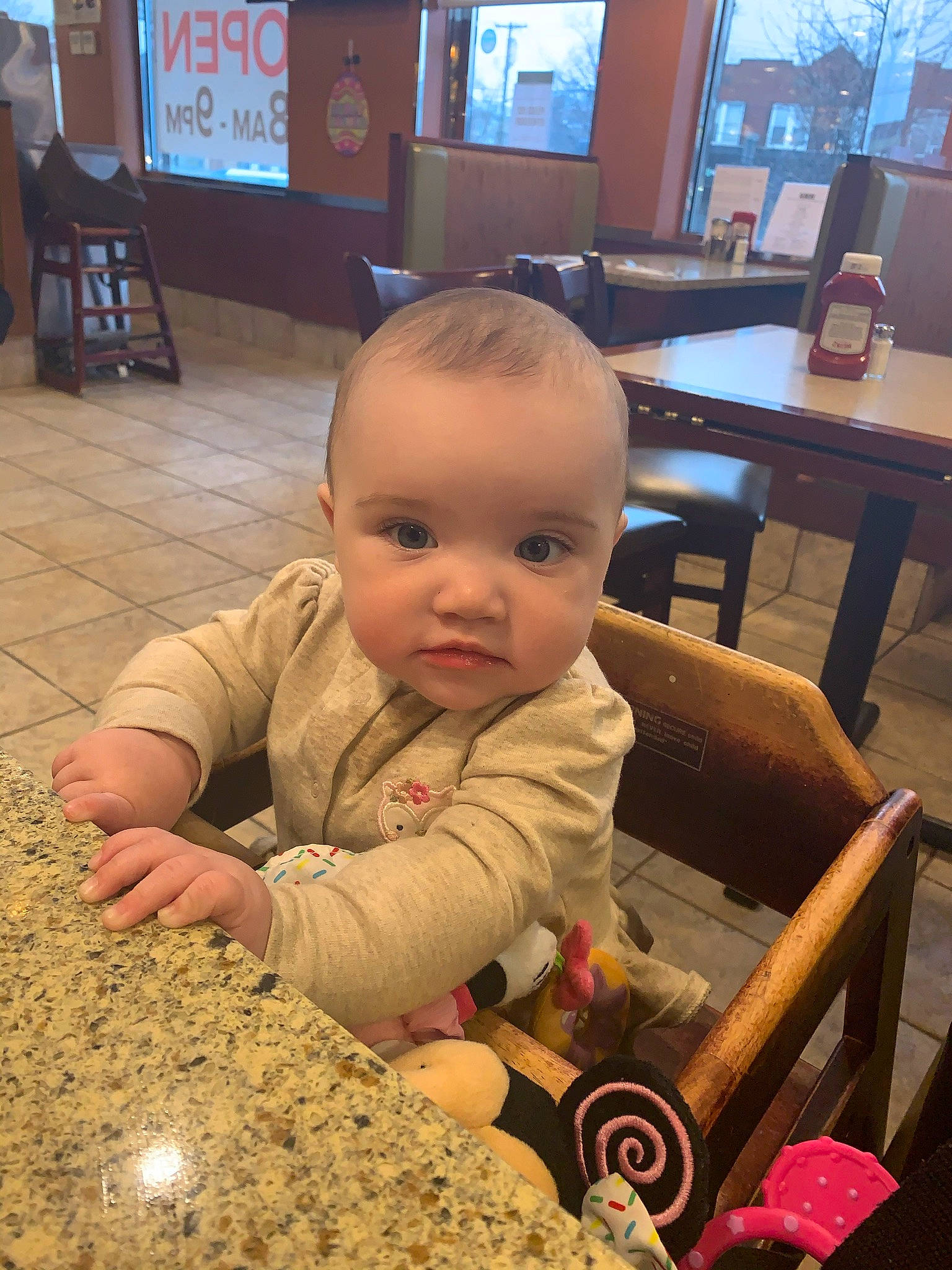 Mila Michele joined the competition — help win amazing prizes! baby, baby_toddler_clothing, chair, cheek, child, crawling, desk, flooring, fun, person, play, room, sitting, snapshot, soil, table, tire, toddler, wheel, window