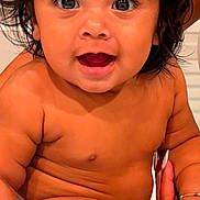 Asher Osiel joined the competition — help win amazing prizes! baby, child, smiling, happy, sitting, skin, hair, face, eyes, mouth, fingers, nails, person, infant, cute, closeup, indoors, expression, joy, toddler