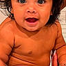 baby, child, smiling, happy, sitting, skin, hair, face, eyes, mouth, fingers, nails, person, infant, cute, closeup, indoors, expression, joy, toddler