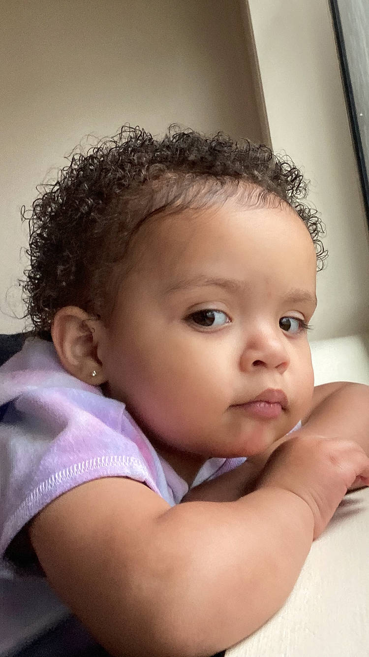 Kyndell is registered to the contest to win money with this photo: baby_toddler_clothing, black_hair, cheek, child, chin, ear, eyebrow, eyelash, flash_photography, fun, gesture, hair, happy, iris, lip, neck, nose, person, shoulder, skin