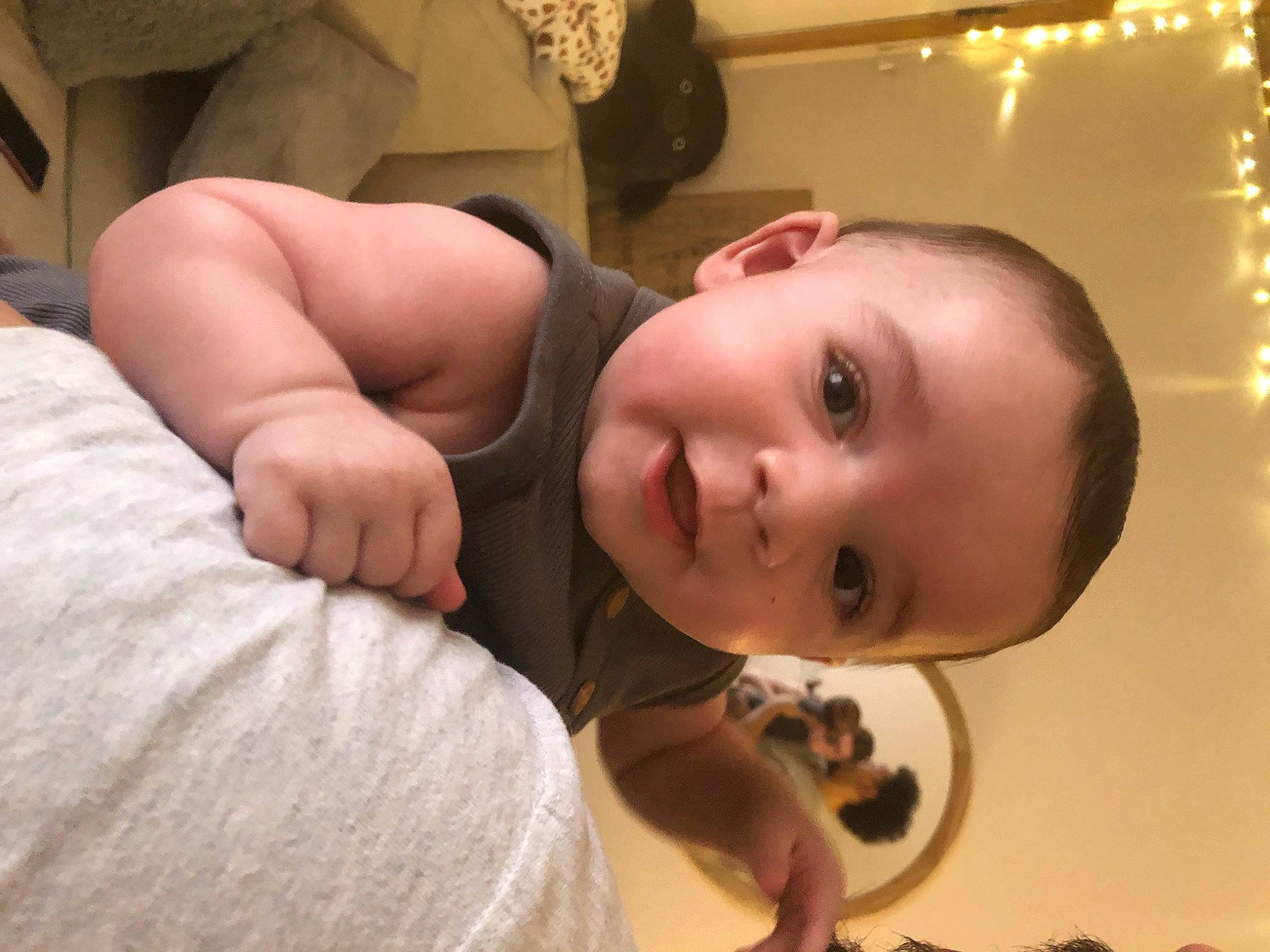 Jaxen is registered to the contest to win money with this photo: baby, cheek, chest, chin, comfort, ear, eyebrow, eyelash, finger, flooring, gesture, happy, iris, mouth, muscle, nose, person, skin, smile, toddler