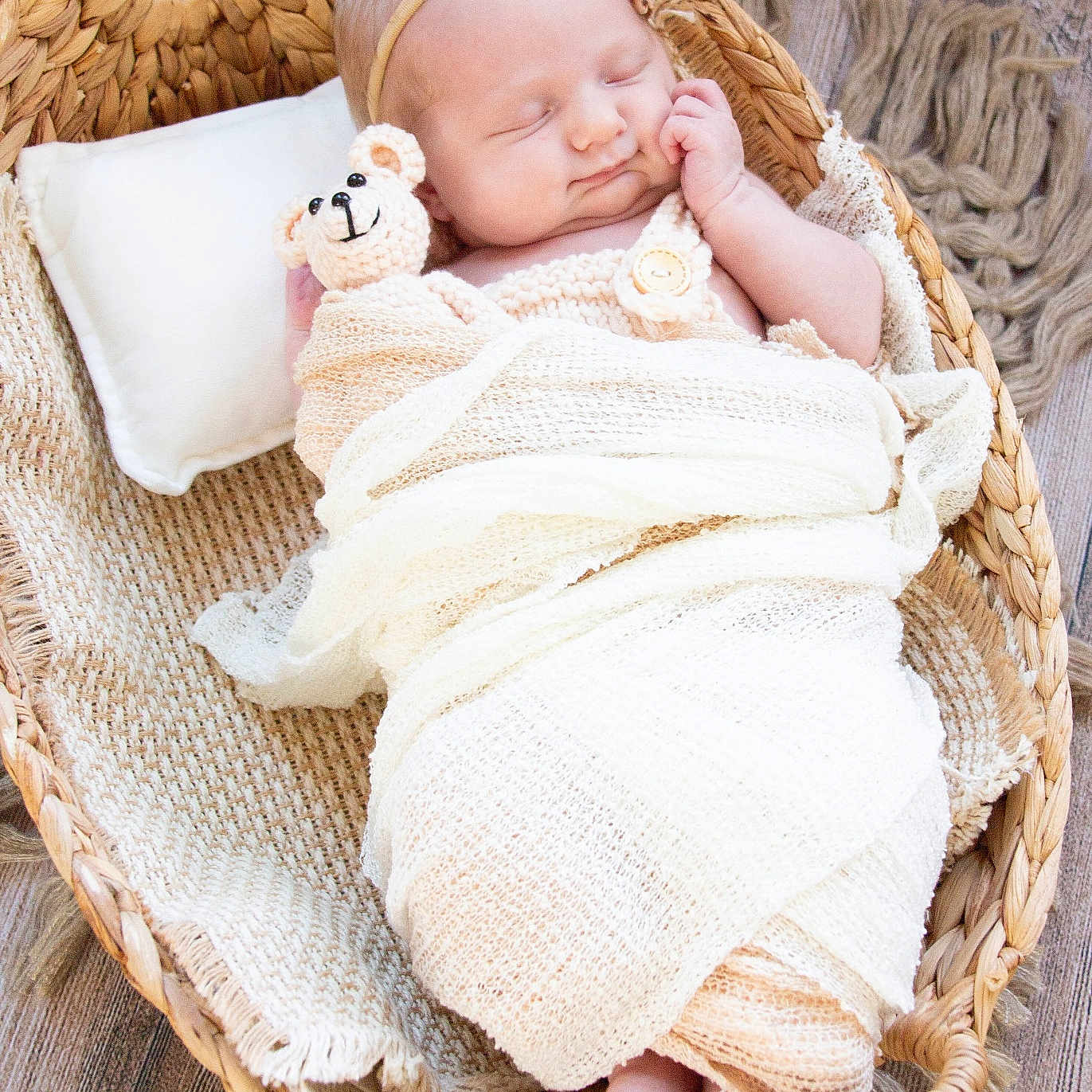 Justina joined the competition — help win amazing prizes! baby, newborn, sleeping, basket, blanket, crocheted_toy, headband, flower, wooden_floor, woven, cozy, infant, cute, peaceful, resting, soft, wrapped, toddler, portrait, indoor