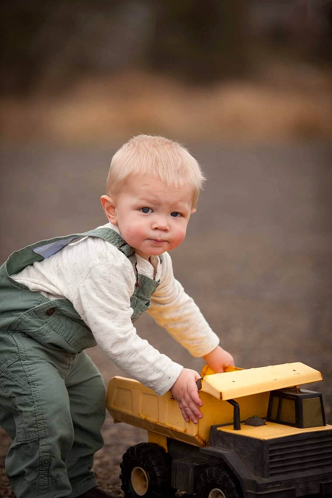 Cleo joined the competition — help win amazing prizes! baby, child, flash_photography, fun, happy, motor_vehicle, orange, person, product, riding_toy, rolling, sitting, smile, standing, tire, toddler, toy, vehicle, vertebrate, wheel