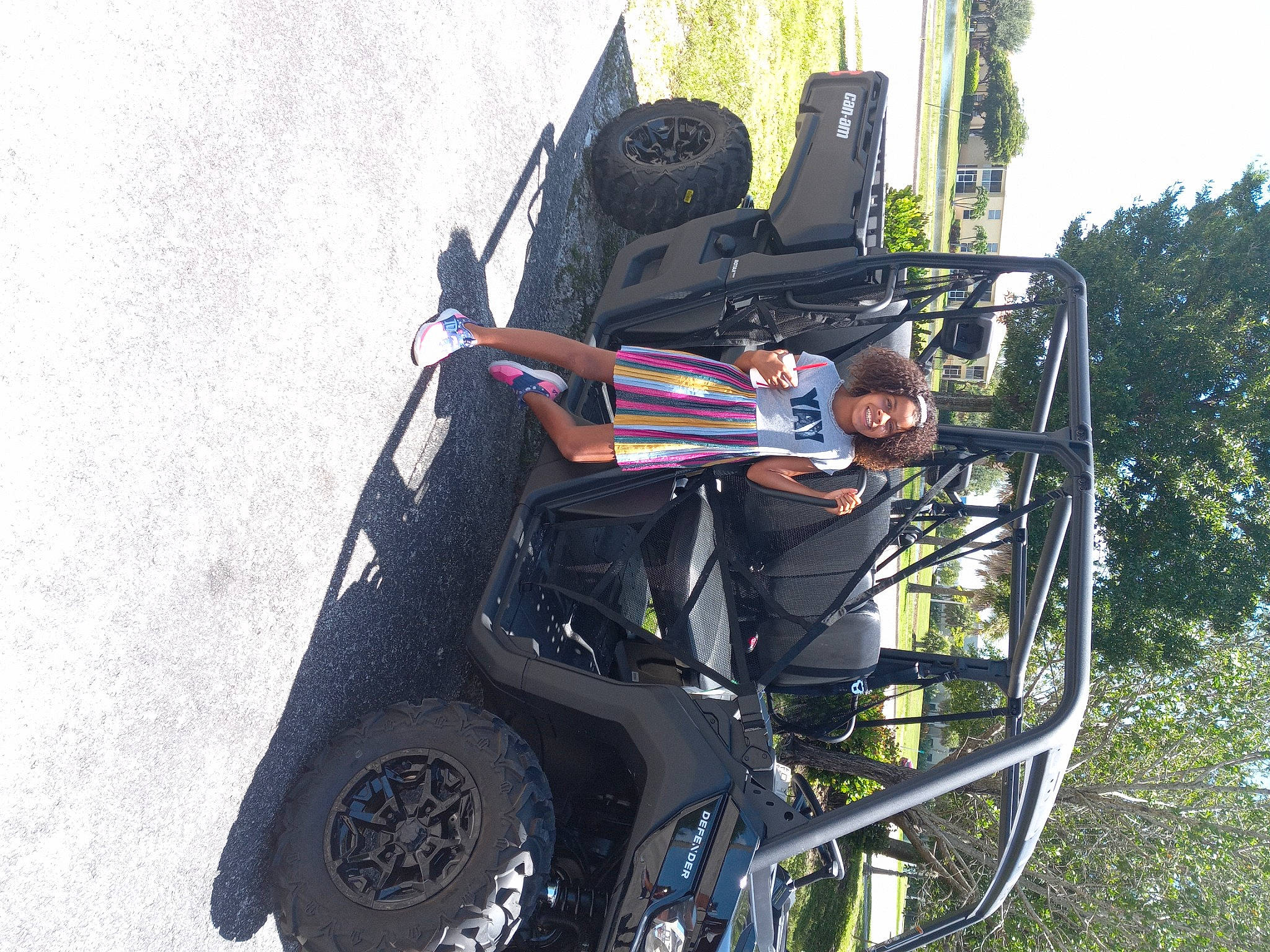 Kariina is registered to the contest to win money with this photo: auto_part, automotive_design, automotive_exterior, automotive_tire, automotive_wheel_system, bag, bumper, fender, joy, luggage_and_bags, motor_vehicle, person, recreation, rim, rolling, sky, spoke, tire, tree, vehicle