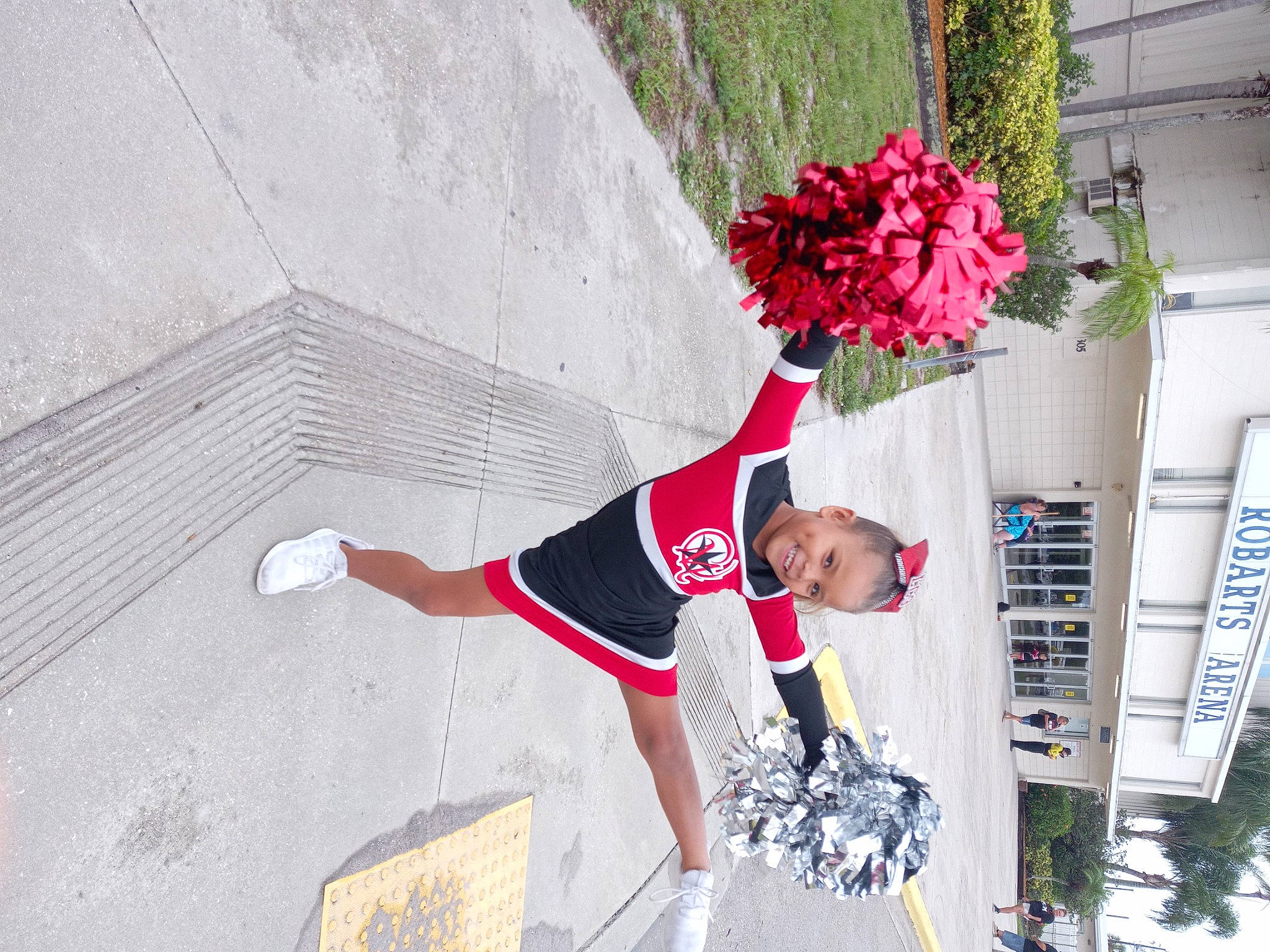 Kaliana is registered to the contest to win money with this photo: artificial_flower, carmine, competition, concrete, cut_flowers, event, floral_design, floristry, flower, flower_arranging, fun, joy, leisure, person, petal, plant, recreation, red, sportswear, tree