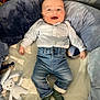 baby, babylaughing, bed, clothing, crib, cushion, face, furniture, happy, head, homedecor, hosiery, infantbed, jeans, pants, person, photography, portrait, sock, yawning