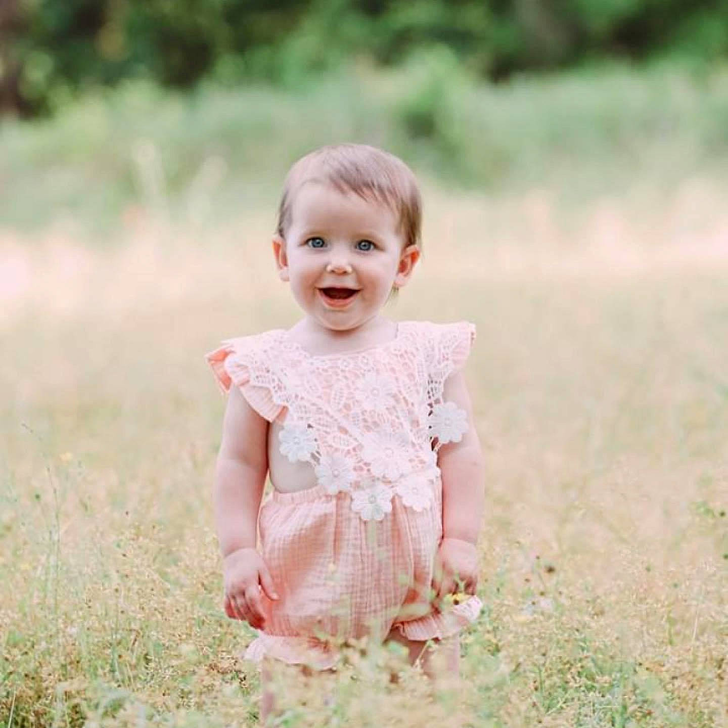 Tenley joined the competition — help win amazing prizes! baby, child, child_model, dress, grass, happy, joy, pattern, people, people_in_nature, person, photograph, photography, pink, portrait, portrait_photography, skin, sleeve, smile, summer