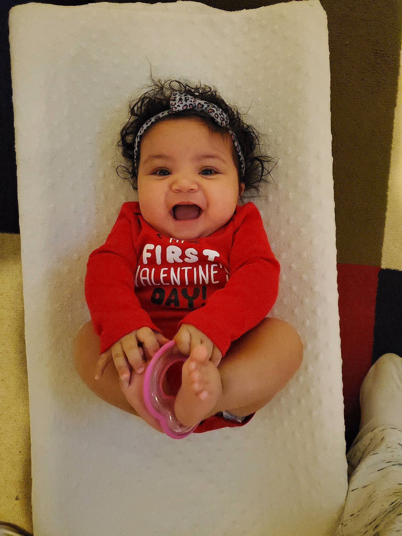 Kylah is registered to the contest to win money with this photo: baby, baby_toddler_clothing, cheek, child, facial_expression, hair_accessory, headwear, lip, person, pink, skin, smile, toddler