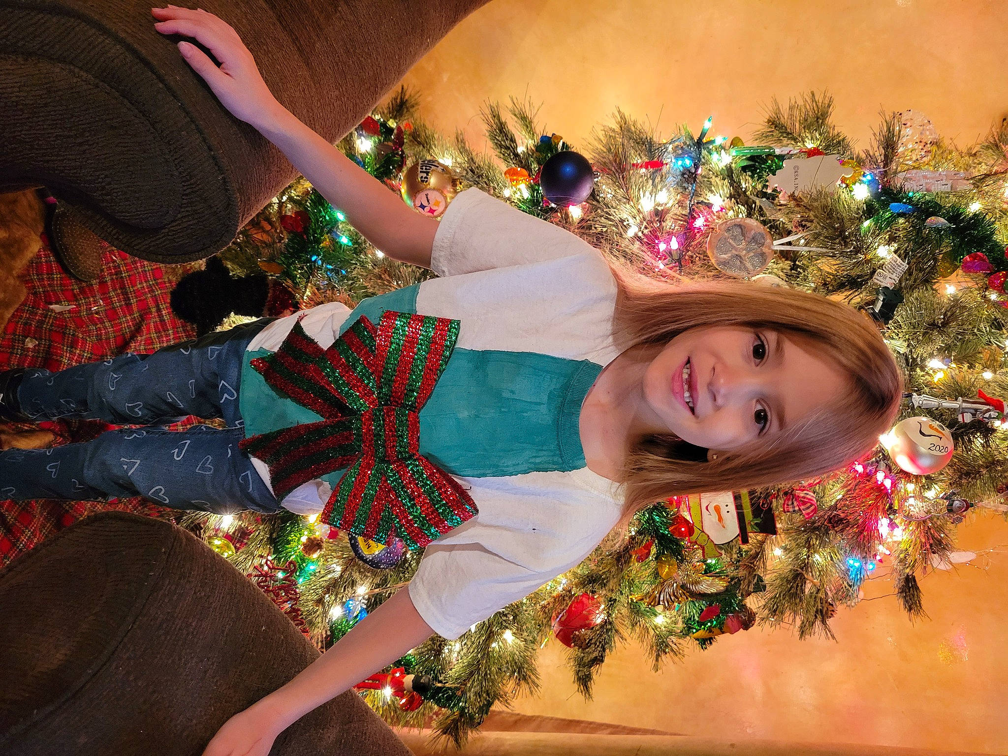 Hayden And Jayden Byers is registered to the contest to win money with this photo: christmas, christmas_decoration, christmas_ornament, christmas_tree, event, fawn, fun, happy, holiday, holiday_ornament, human_body, human_leg, joy, lap, light, ornament, people_in_nature, person, plant, smile