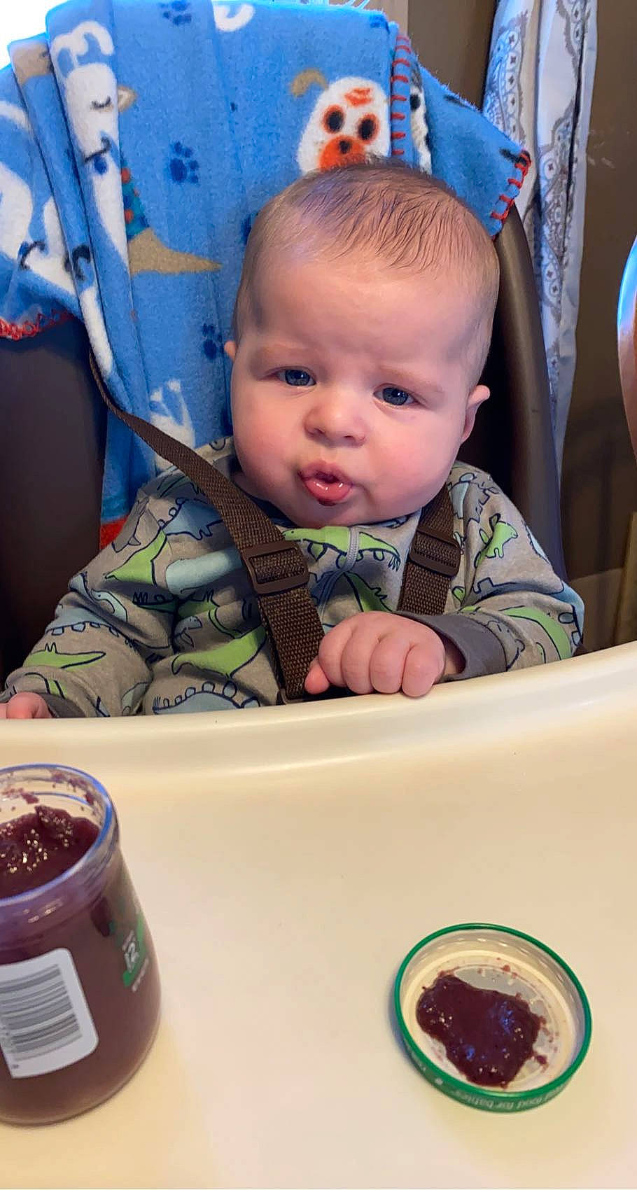 Clay is registered to the contest to win money with this photo: baby, baby_toddler_clothing, beauty, blue, chair, cheek, child, coffee, cup, drinkware, face, food, ingredient, person, photograph, product, serveware, skin, table, tableware