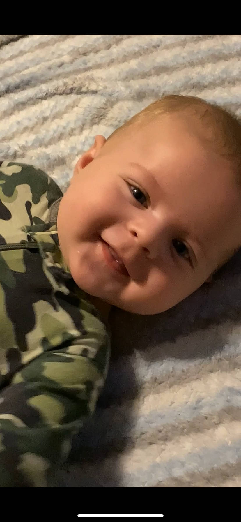 Clay joined the competition — help win amazing prizes! baby, baby_laughing, baby_toddler_clothing, camouflage, cheek, child, comfort, eyelash, happy, human_body, iris, joy, lip, military_camouflage, military_person, military_uniform, nose, pattern, person, smile