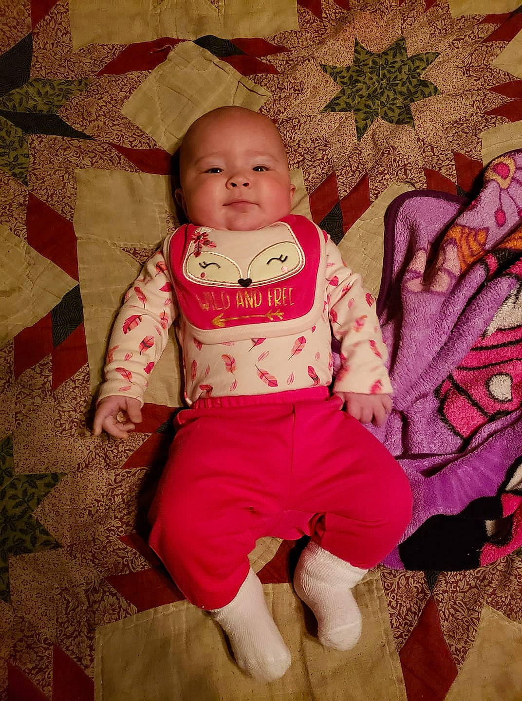 Jalynn is registered to the contest to win money with this photo: baby, cheek, child, person, pink, sitting, skin, smile, textile, toddler