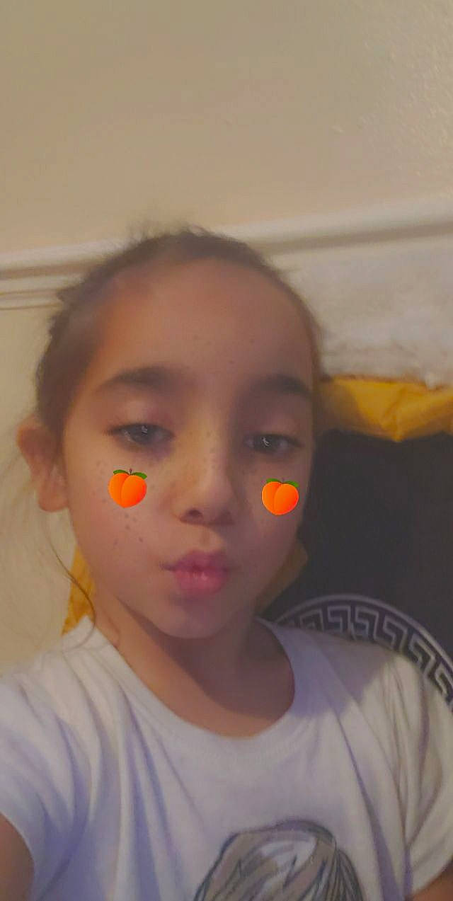 Ana Maria joined the competition — help win amazing prizes! audio_equipment, cheek, chin, ear, eyebrow, eyelash, forehead, fun, happy, human_body, iris, jaw, lip, mouth, neck, nose, orange, person, shoulder, skin