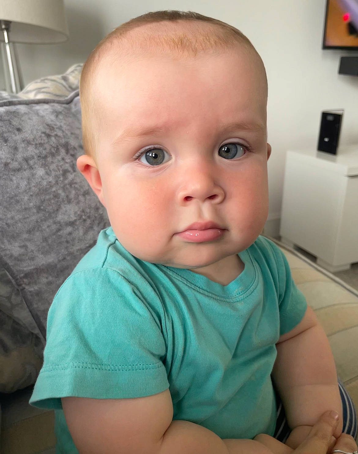 Beauden is registered to the contest to win money with this photo: arm, baby, baby_toddler_clothing, cheek, comfort, eye, eyebrow, eyelash, fun, hairstyle, iris, lip, mouth, muscle, nose, person, picture_frame, skin, sleeve, t_shirt
