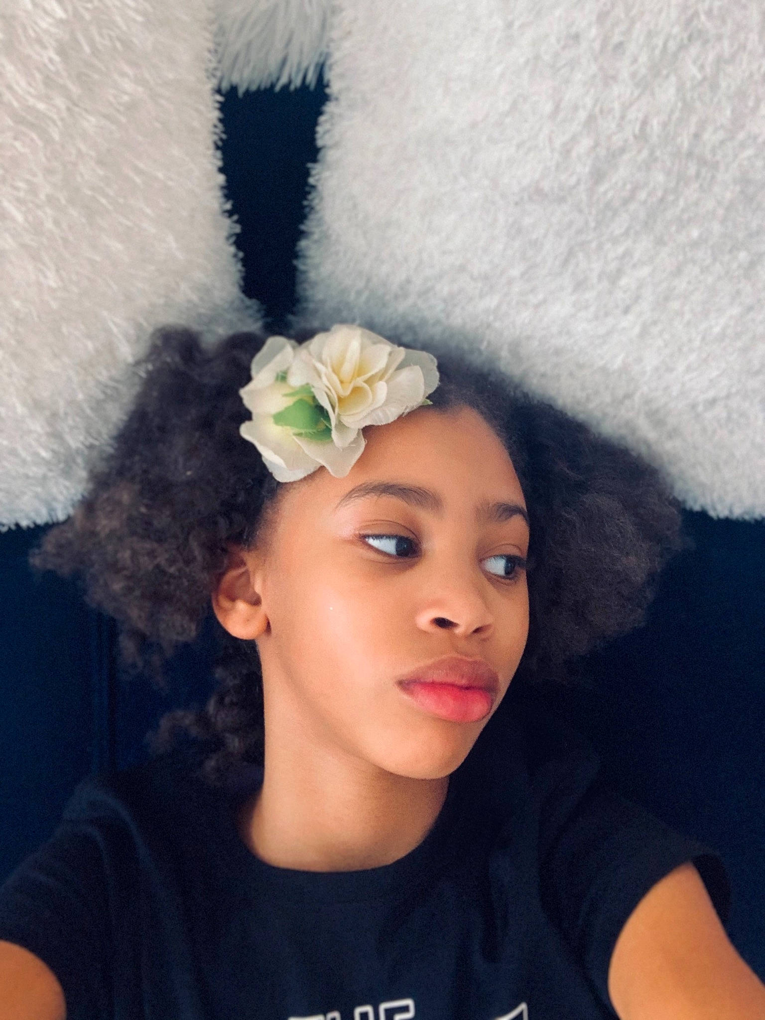 Tori is registered to the contest to win money with this photo: beauty, child, chin, ear, eye, face, fashion_accessory, flower, forehead, hair, hair_accessory, hairstyle, head, headgear, headpiece, lip, nose, person, skin, white