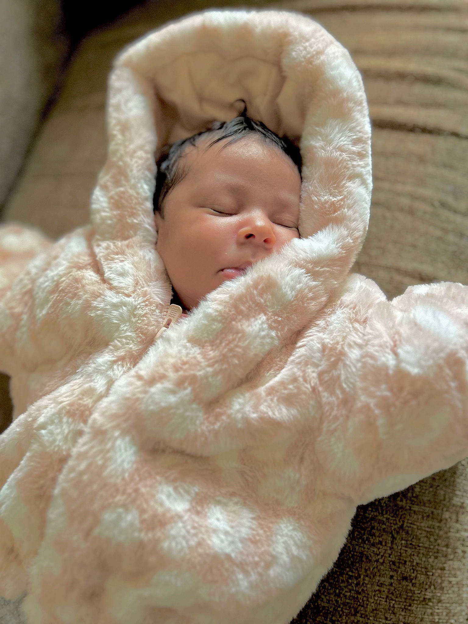 Darasimi joined the competition — help win amazing prizes! baby, baby_sleeping, baby_toddler_clothing, child, comfort, face, fur, head, linens, peach, person, portrait_photography, sleeve, thumb, toddler