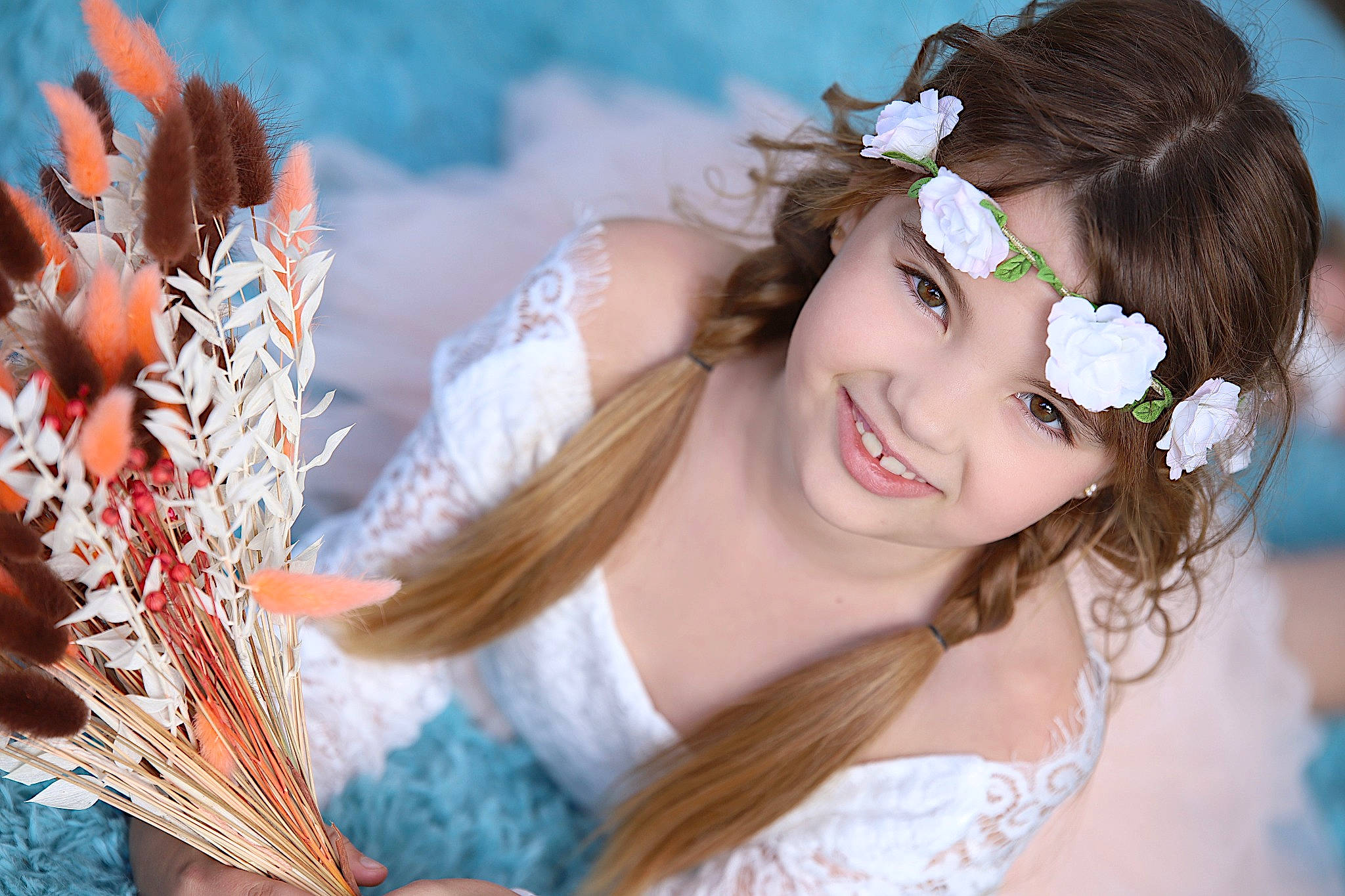 Emilia participe au concours pour gagner de l'argent avec cette photo : black_hair, bridal_clothing, bride, dress, eye, eyelash, flash_photography, hairstyle, hand, happy, head, headgear, headpiece, human, joy, people_in_nature, person, petal, plant, smile