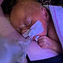 Johnathan is registered to the contest to win money with this photo: newborn, baby, infant, sleeping, blanket, medical_tape, feeding_tube, arm, human_hand, skin, hospital, care, closeup, resting, fragile, indoor, person, cute, healthcare, quiet