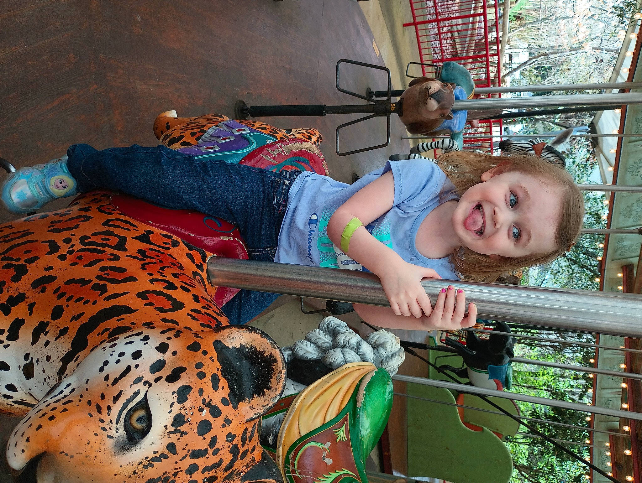 Evie joined the competition — help win amazing prizes! bengal_tiger, big_cats, carnivore, child, eye, felidae, fun, fur, happy, hat, head, joy, leisure, mammal, pattern, person, shorts, sitting, smile, terrestrial_animal