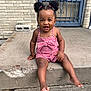 toddler, child, smiling, outdoor, concrete, steps, red_checkered, hair_puffs, barefoot, cute, happy, person, sitting, playful, young_child, casual_clothing, daylight, porch, front_door, expression