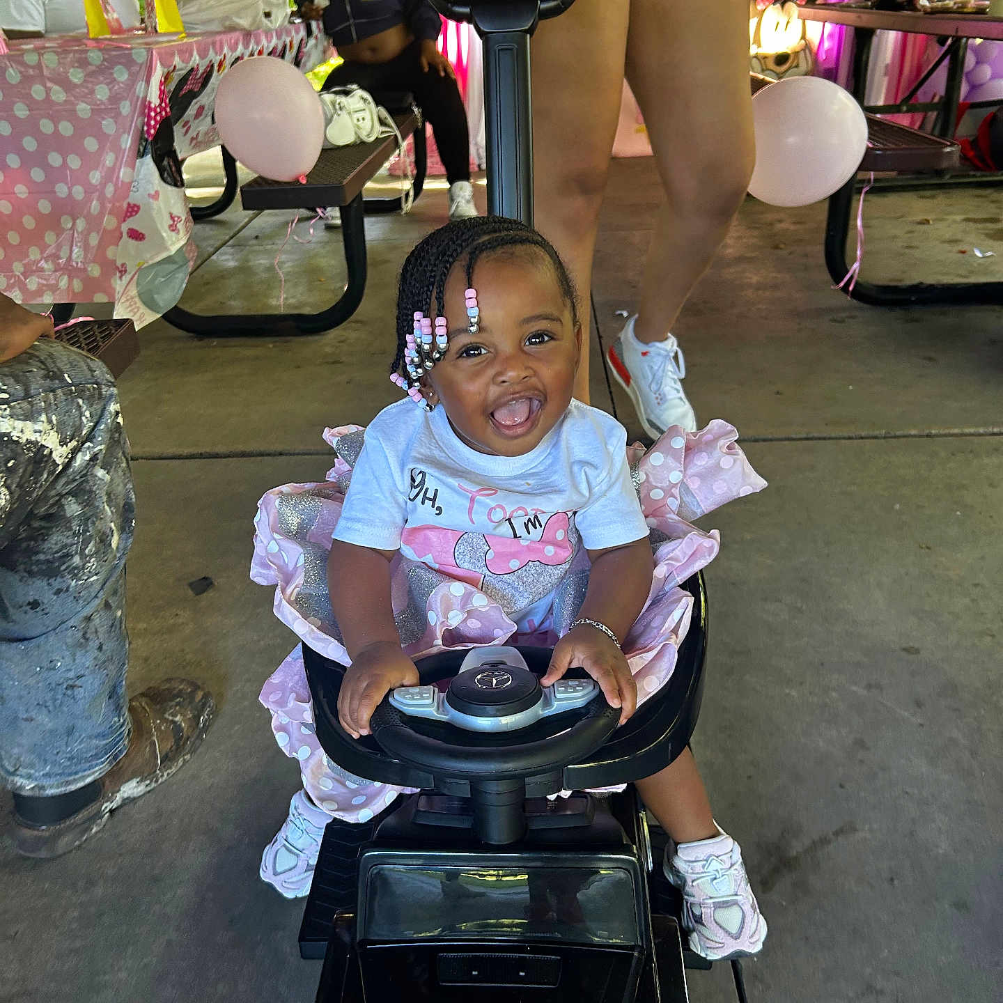 Nichol Mae Harris joined the competition — help win amazing prizes! balloon, beads, braids, celebration, child, event, family, happy, outdoor, party, person, picnic, pink, shorts, smile, sneakers, steering_wheel, table, toddler, toy_car