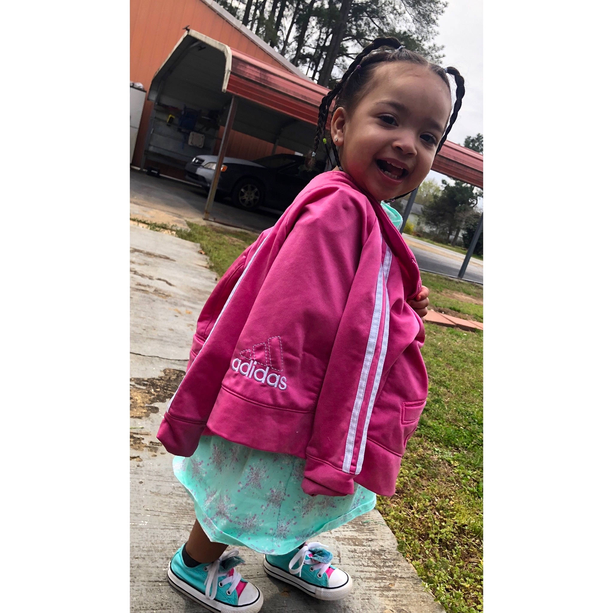 Kaelyn is registered to the contest to win money with this photo: child, child_model, cool, happy, hood, jacket, magenta, outerwear, people, person, pink, plant, play, shoe, smile, street_fashion, t_shirt, textile, toddler, turquoise