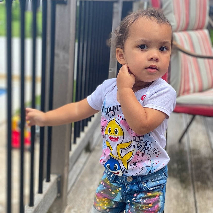 Aspyn joined the competition — help win amazing prizes! baby, baby_toddler_clothing, cheek, child, face, fence, fun, hair, hairstyle, happy, head, iris, leisure, nose, person, recreation, skin, sleeve, smile, toddler