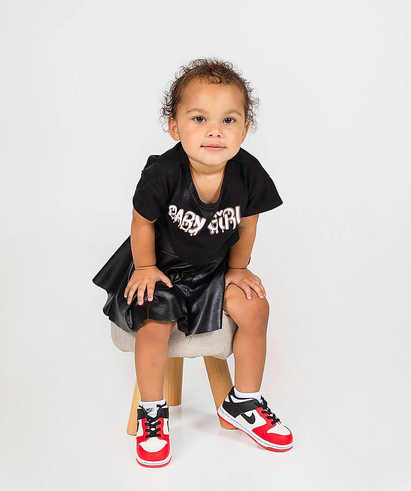 Aspyn is registered to the contest to win money with this photo: baby_toddler_clothing, child, elbow, electric_blue, face, fashion_design, flash_photography, footwear, hair, happy, human_leg, knee, neck, pattern, person, shorts, sitting, sleeve, sportswear, t_shirt