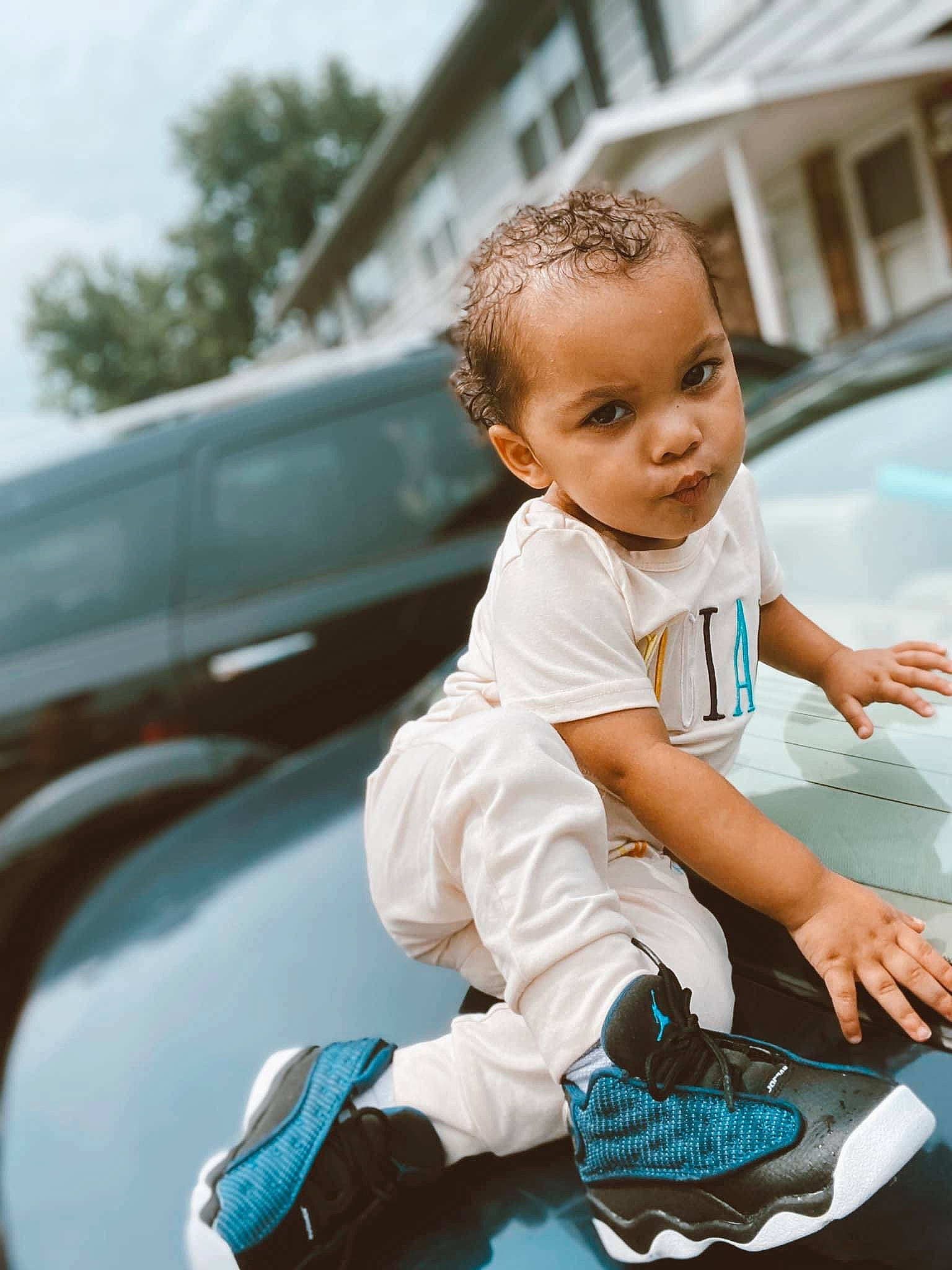 Aspyn joined the competition — help win amazing prizes! automotive_design, baby, baby_products, baby_toddler_clothing, bumper, child, flash_photography, flooring, fun, grass, happy, leisure, person, play, recreation, sitting, skin, sky, t_shirt, toddler