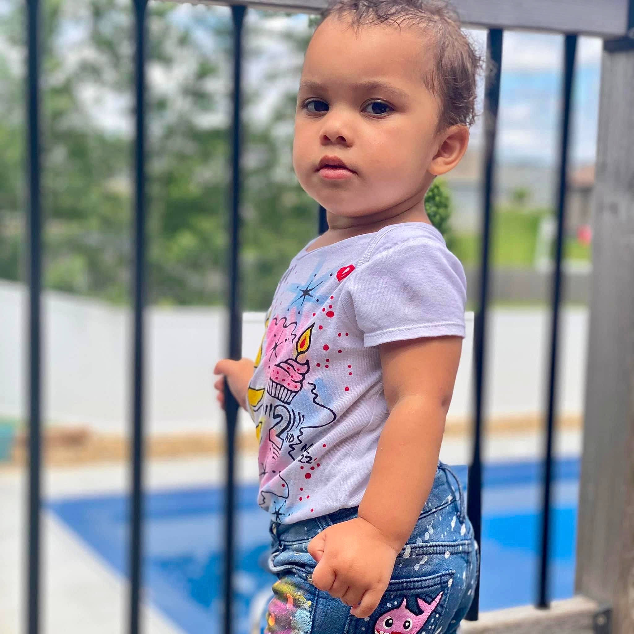 Aspyn joined the competition — help win amazing prizes! baby, baby_toddler_clothing, child, city, denim, electric_blue, fun, happy, leisure, outdoor_play_equipment, pattern, person, recreation, sitting, sleeve, swing, t_shirt, toddler, tree, vacation