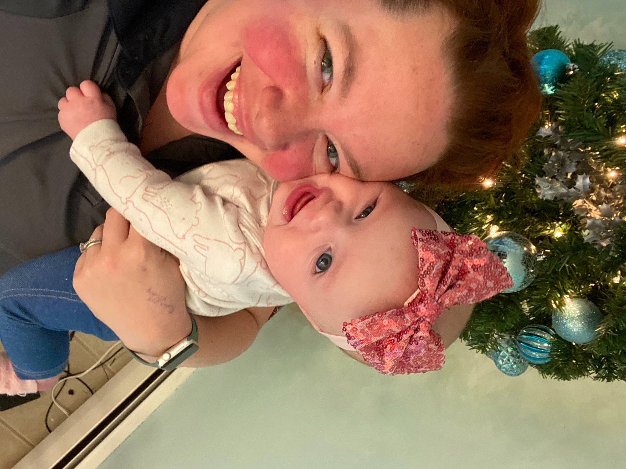 Juniper joined the competition — help win amazing prizes! baby, baby_toddler_clothing, cheek, child, christmas_ornament, christmas_tree, event, facial_expression, fun, gesture, happy, headwear, holiday, holiday_ornament, joy, lip, mouth, nose, ornament, person