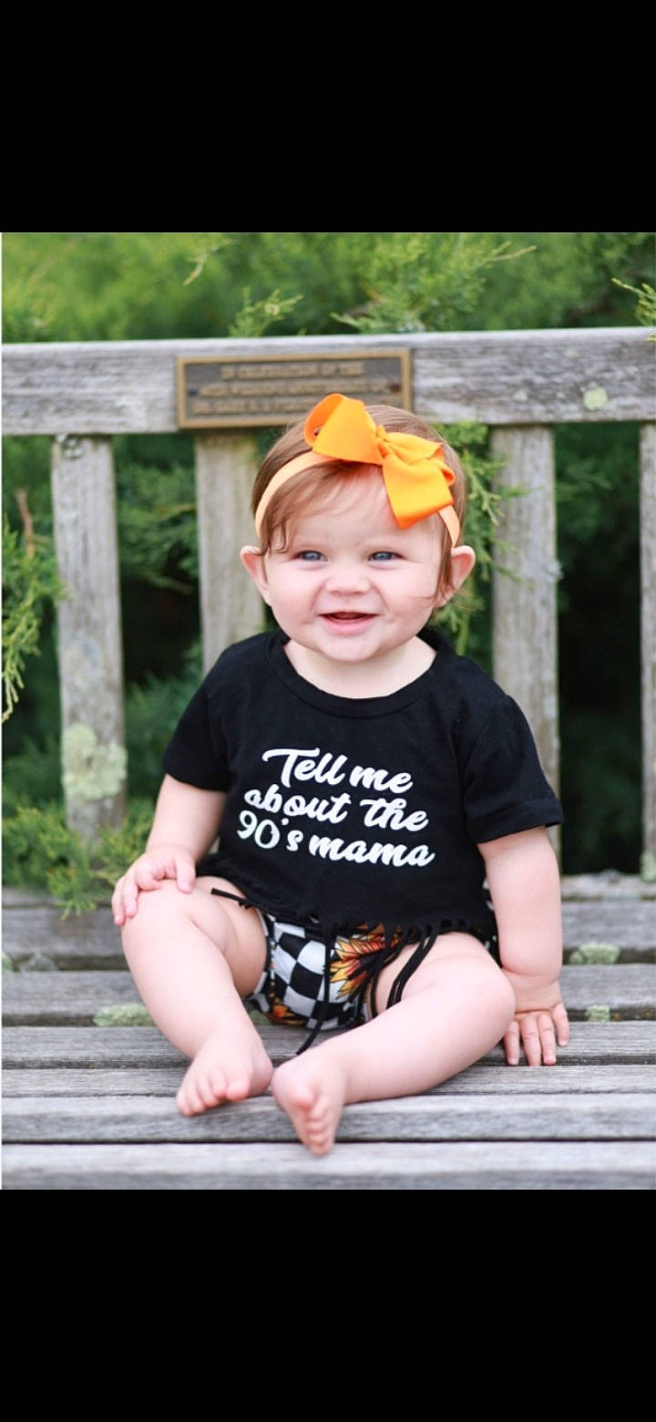 Sutton joined the competition — help win amazing prizes! baby, baby_toddler_clothing, cap, child, clothing, fence, flash_photography, fun, grass, happy, hat, joy, pattern, person, pink, plant, recreation, sleeve, smile, t_shirt