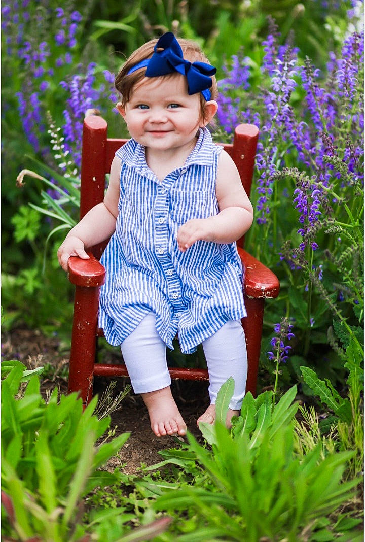 Sutton joined the competition — help win amazing prizes! baby_toddler_clothing, blue, botany, flower, grass, grass_family, green, happy, hat, iris, joy, leaf, people, people_in_nature, person, photograph, plant, purple, smile, summer