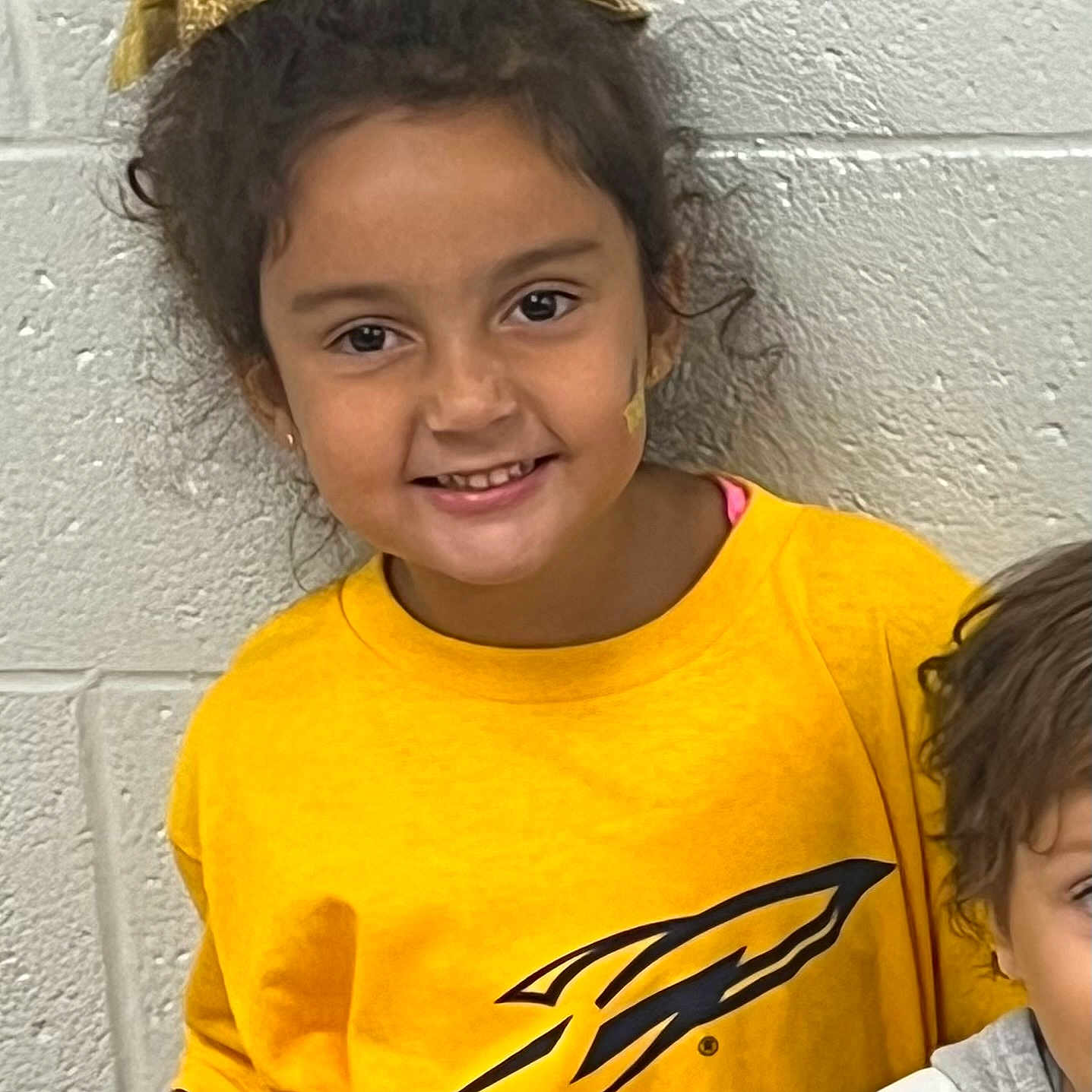 Ariana joined the competition — help win amazing prizes! accessories, bodypart, boy, child, clothing, face, female, girl, hair, happy, head, male, mouth, person, photography, portrait, shirt, sleeve, smile, t_shirt