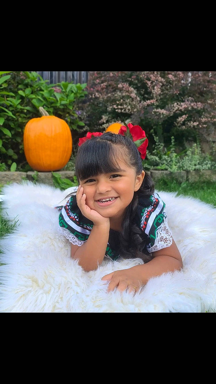 Kailani joined the competition — help win amazing prizes! black_hair, botany, calabaza, cucurbita, dress, flash_photography, fun, gourd, grass, happy, joy, leisure, natural_foods, people_in_nature, person, plant, pumpkin, smile, squash, summer