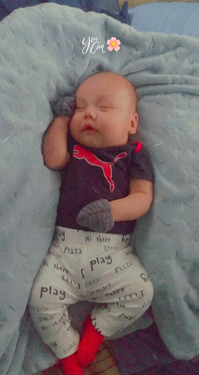 Cashton is registered to the contest to win money with this photo: active_pants, baby, baby_products, baby_toddler_clothing, cheek, child, comfort, human_body, linens, nightwear, pajamas, peach, person, pink, sock, stomach, textile, toddler