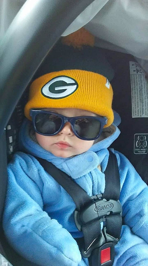 Calvin joined the competition — help win amazing prizes! baby, car_seat, car_seat_cover, comfort, cool, eyewear, goggles, head_restraint, headwear, hood, jacket, person, polar_fleece, product, sunglasses, vehicle_door, vision_care