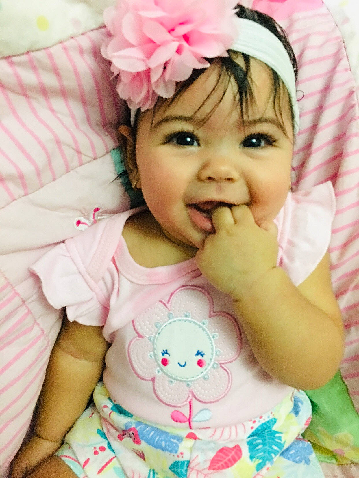 Ashley is registered to the contest to win money with this photo: baby, baby_toddler_clothing, beauty, cheek, child, face, facial_expression, hair_accessory, happy, head, headband, headgear, headwear, joy, lip, mouth, nose, person, pink, skin