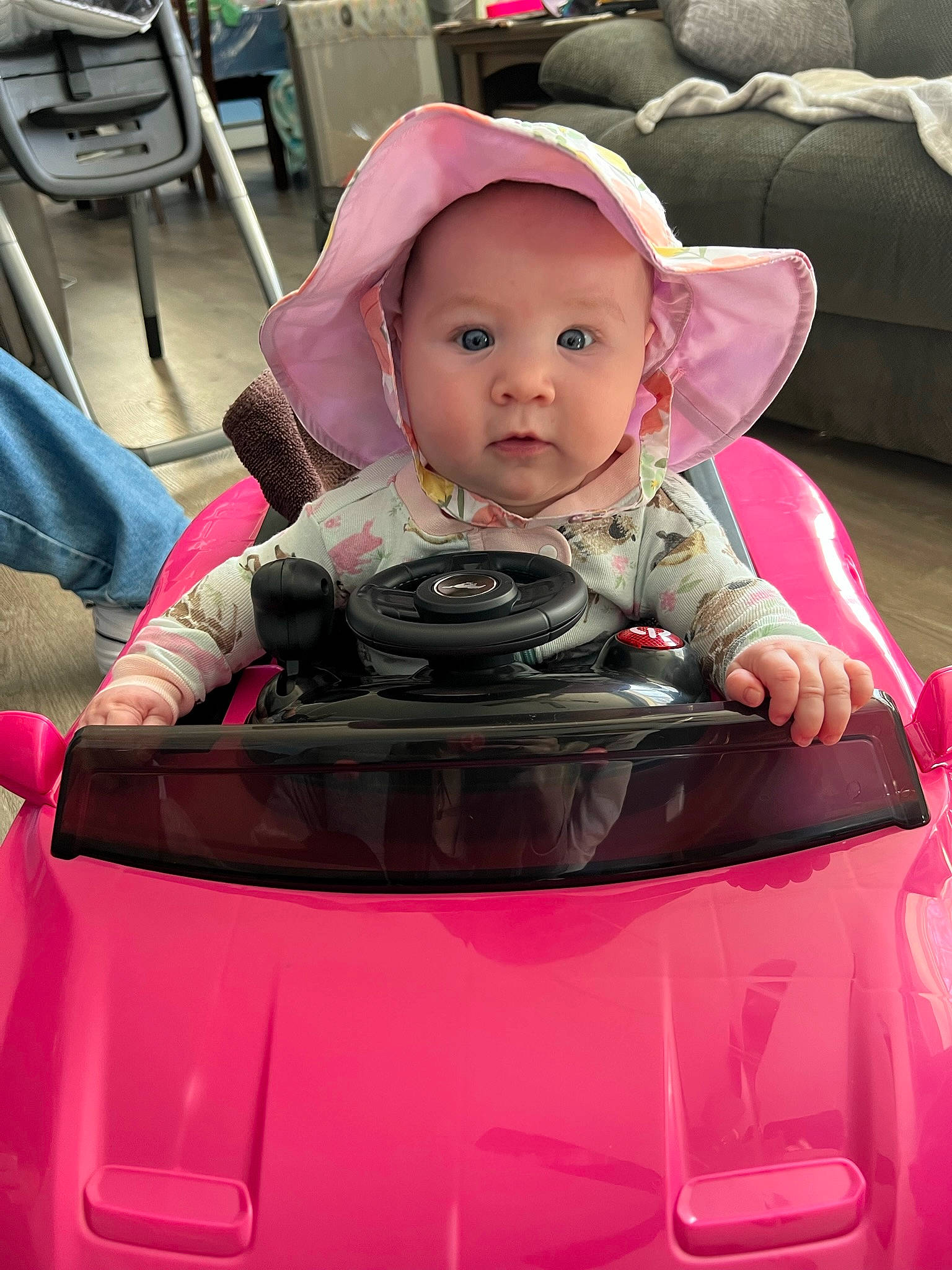Ivy is registered to the contest to win money with this photo: automotive_design, automotive_exterior, automotive_lighting, automotive_tire, baby, baby_carriage, bumper, car, chair, child, fun, grille, headwear, hood, motor_vehicle, person, personal_luxury_car, pink, toddler, trunk