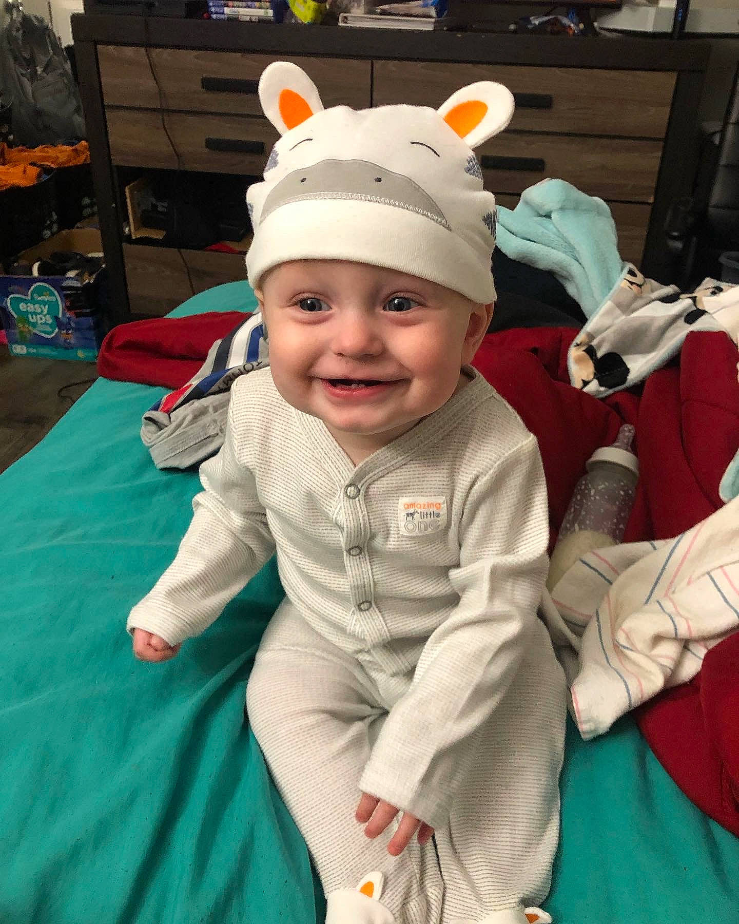 Bryliex is registered to the contest to win money with this photo: baby, baby_toddler_clothing, baseball_cap, beanie, cap, child, costume, costume_hat, event, fashion_accessory, fictional_character, fun, fur, grass, happy, headwear, holiday, joy, person, personal_protective_equipment
