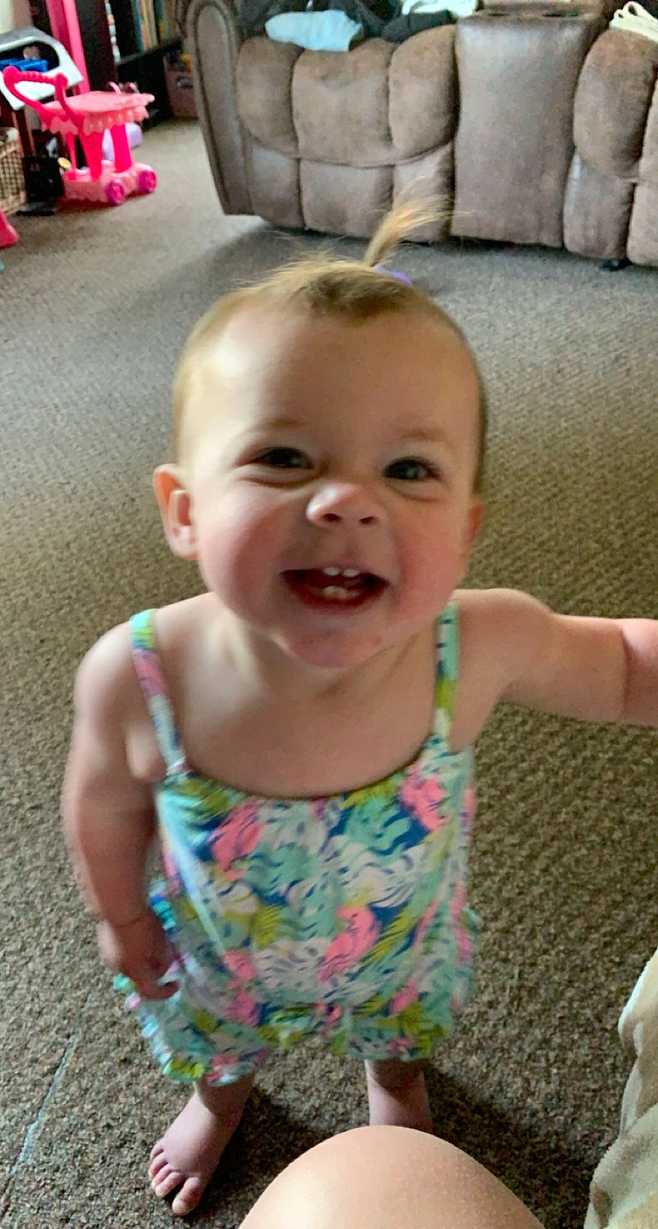 Laney joined the competition — help win amazing prizes! baby, baby_toddler_clothing, cheek, couch, face, facial_expression, finger, happy, head, human_body, iris, joy, mouth, nose, people, person, photograph, pink, skin, smile