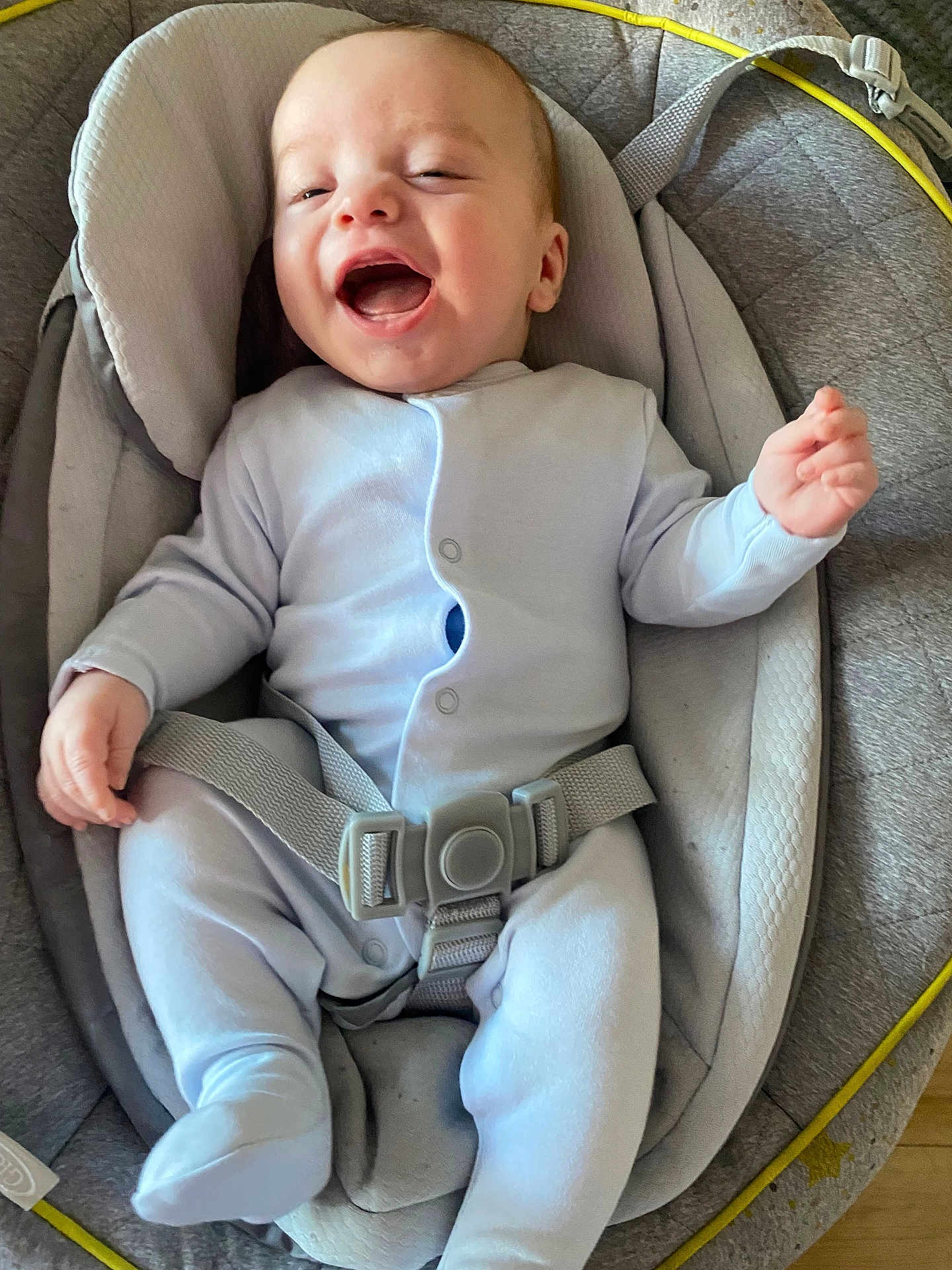 Andrew Junior is registered to the contest to win money with this photo: baby, baby_boy, baby_seat, child, clothing, comfort, cute, happy, head_support, indoor, infant, joyful, laughing, newborn, onesie, padded, person, seat, smiling, straps