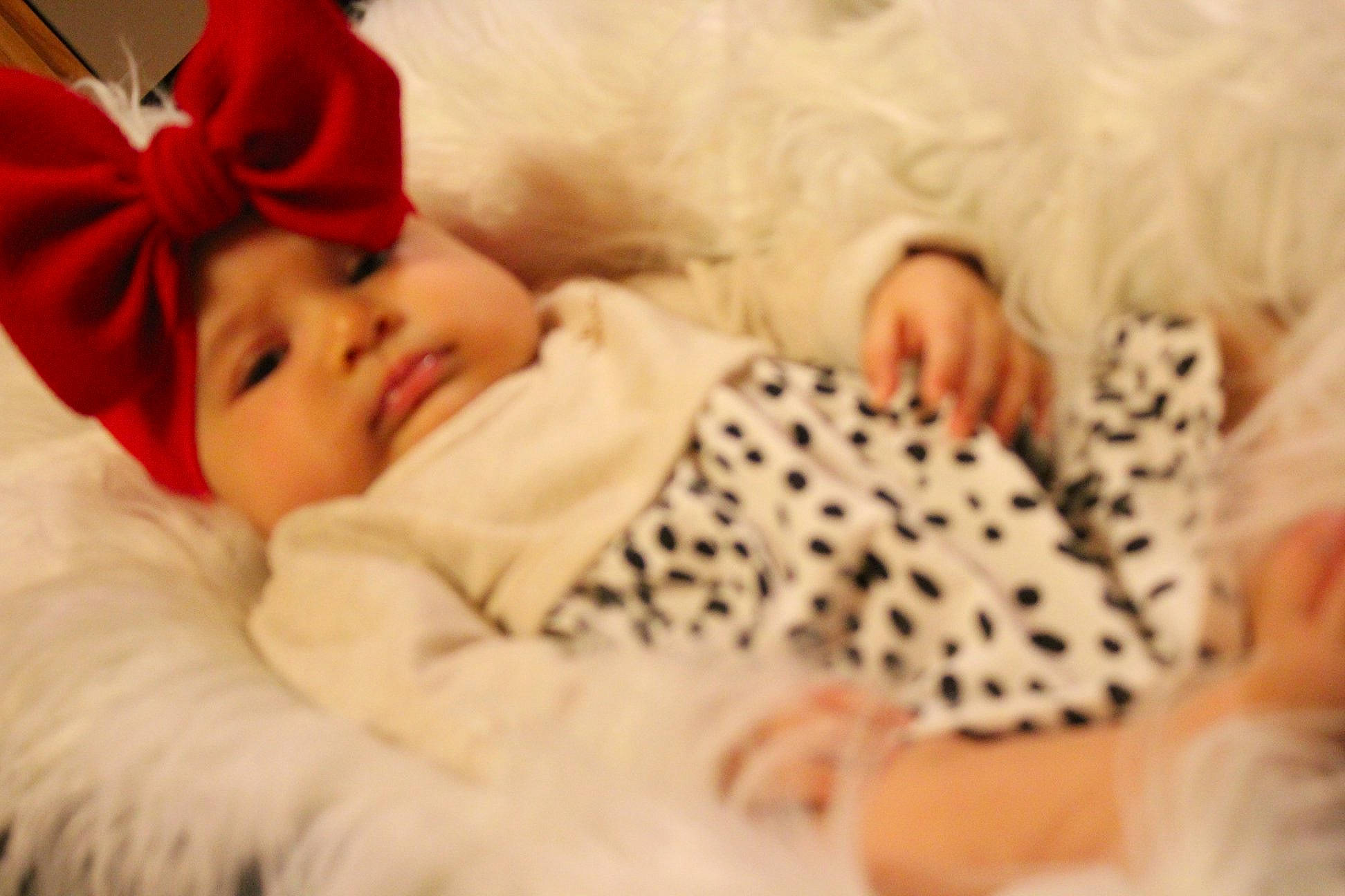 Lianna is registered to the contest to win money with this photo: bedtime, child, ear, fur, girl, hair_accessory, infant, person, product, skin, sleep, textile, toddler