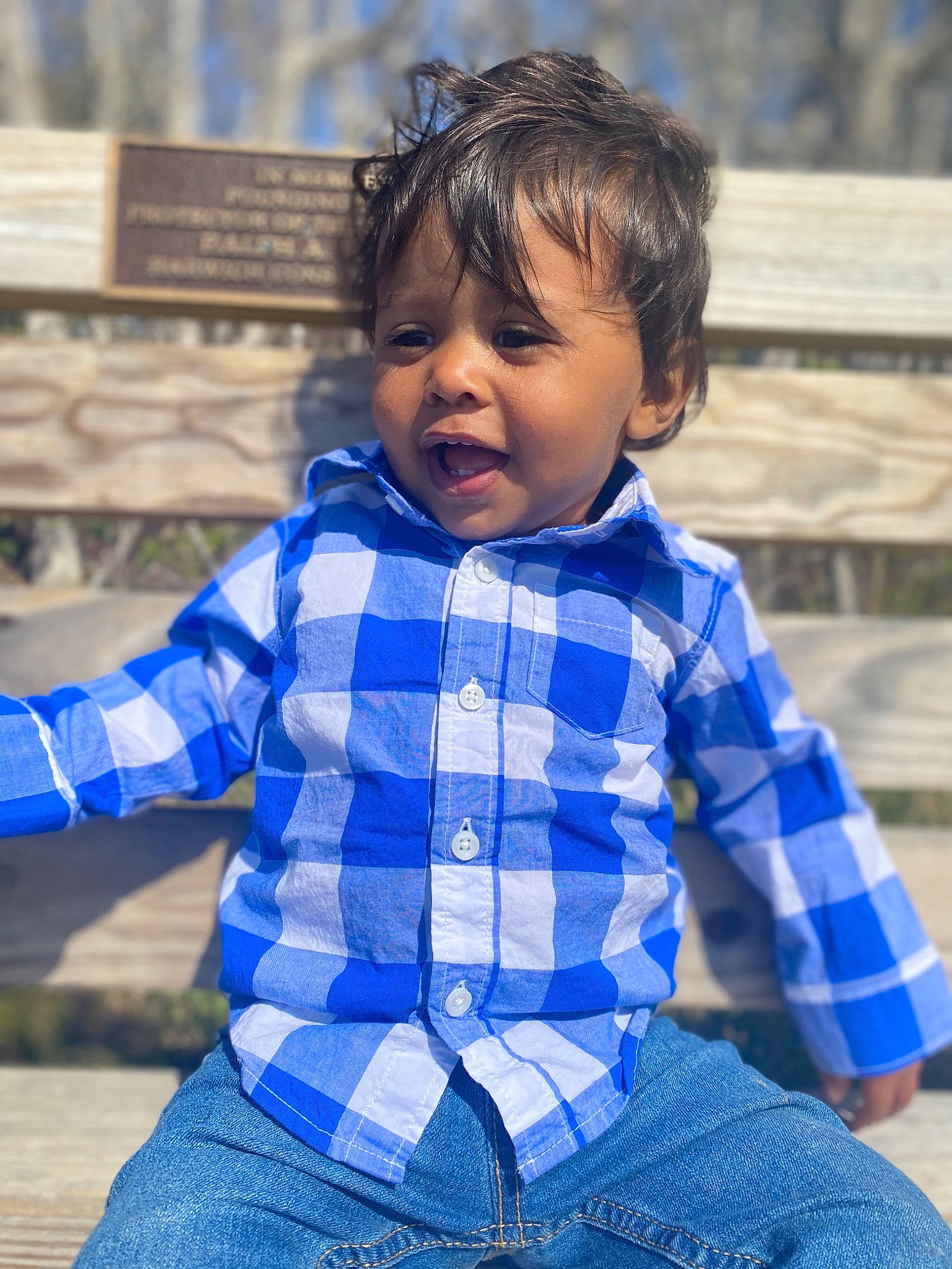 Jayden is registered to the contest to win money with this photo: baby_toddler_clothing, blue, chin, clothing, eye, facial_expression, grass, hair, hairstyle, happy, head, iris, light, person, photograph, shoulder, skin, sleeve, standing, tartan