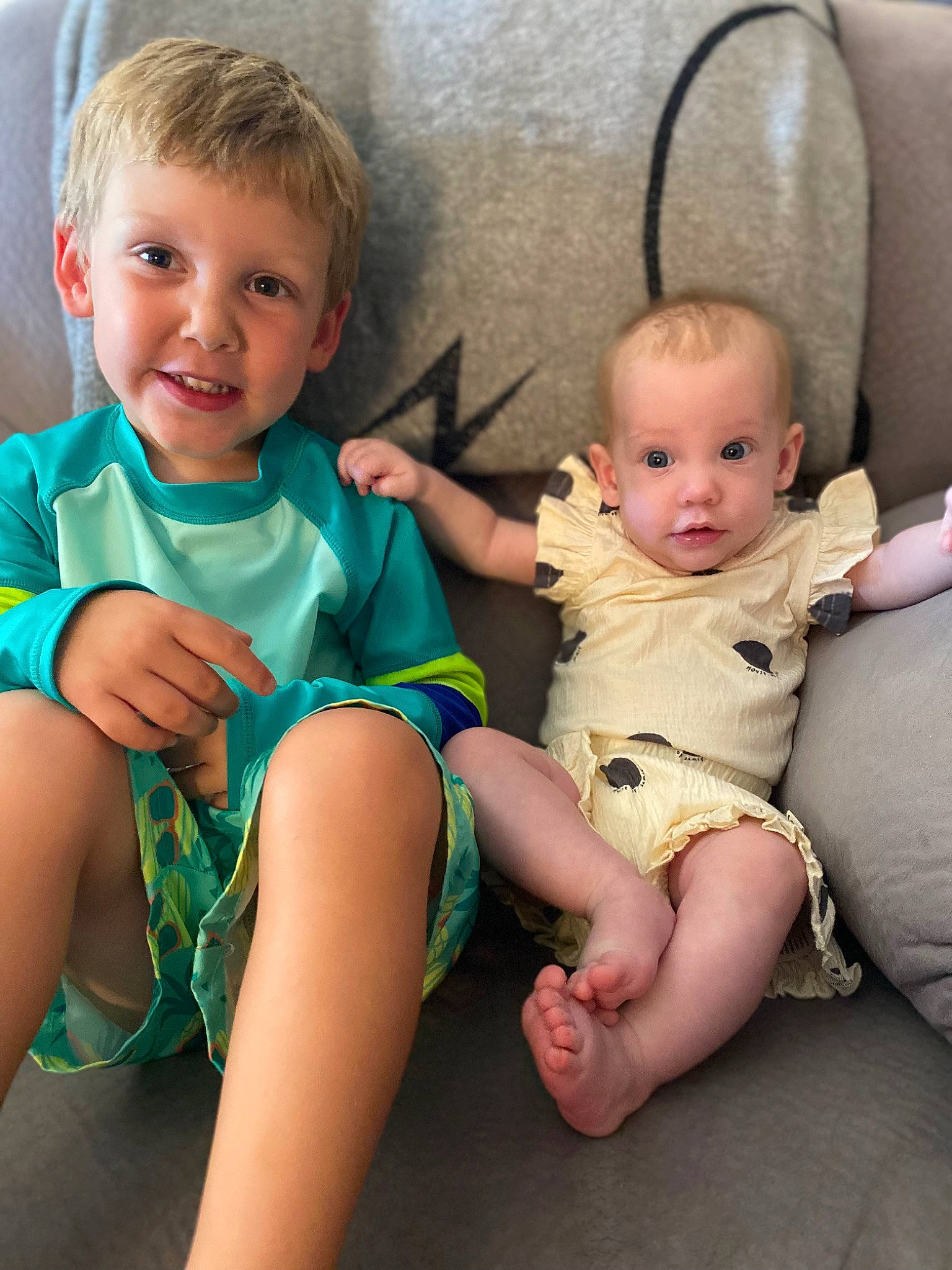 Samantha is registered to the contest to win money with this photo: arm, baby, baby_toddler_clothing, chair, cheek, comfort, finger, fun, hairstyle, happy, human_body, iris, joint, lap, leg, mouth, person, skin, smile, thigh