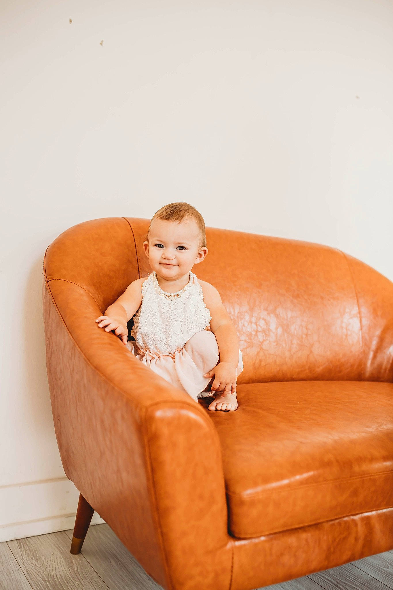 Sandra joined the competition — help win amazing prizes! blond, brown_hair, child, comfort, couch, eye, flooring, fun, furniture, human_body, human_leg, joy, leisure, person, room, sitting, skin, smile, studio_couch, thigh