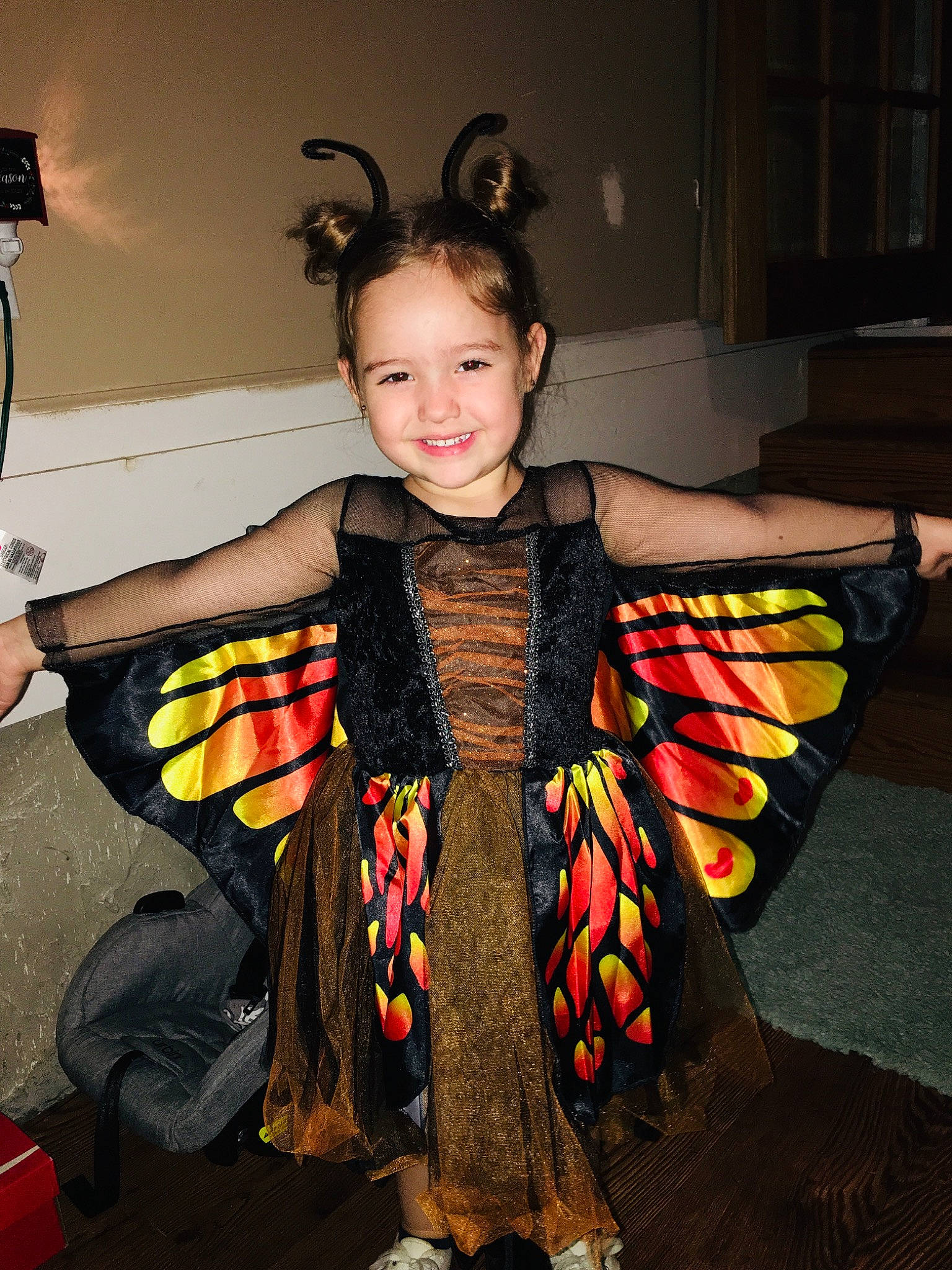 Mya is registered to the contest to win money with this photo: child, costume, joy, person, toddler, wing