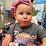 Ivy joined the competition — help win amazing prizes! toddler, child, shopping_cart, headband, pink_bow, shirt, ford_bronco, hands, face, indoor, store, aisle, floral_pattern, clothing, portrait, cute, curious, baby, retail, grocery